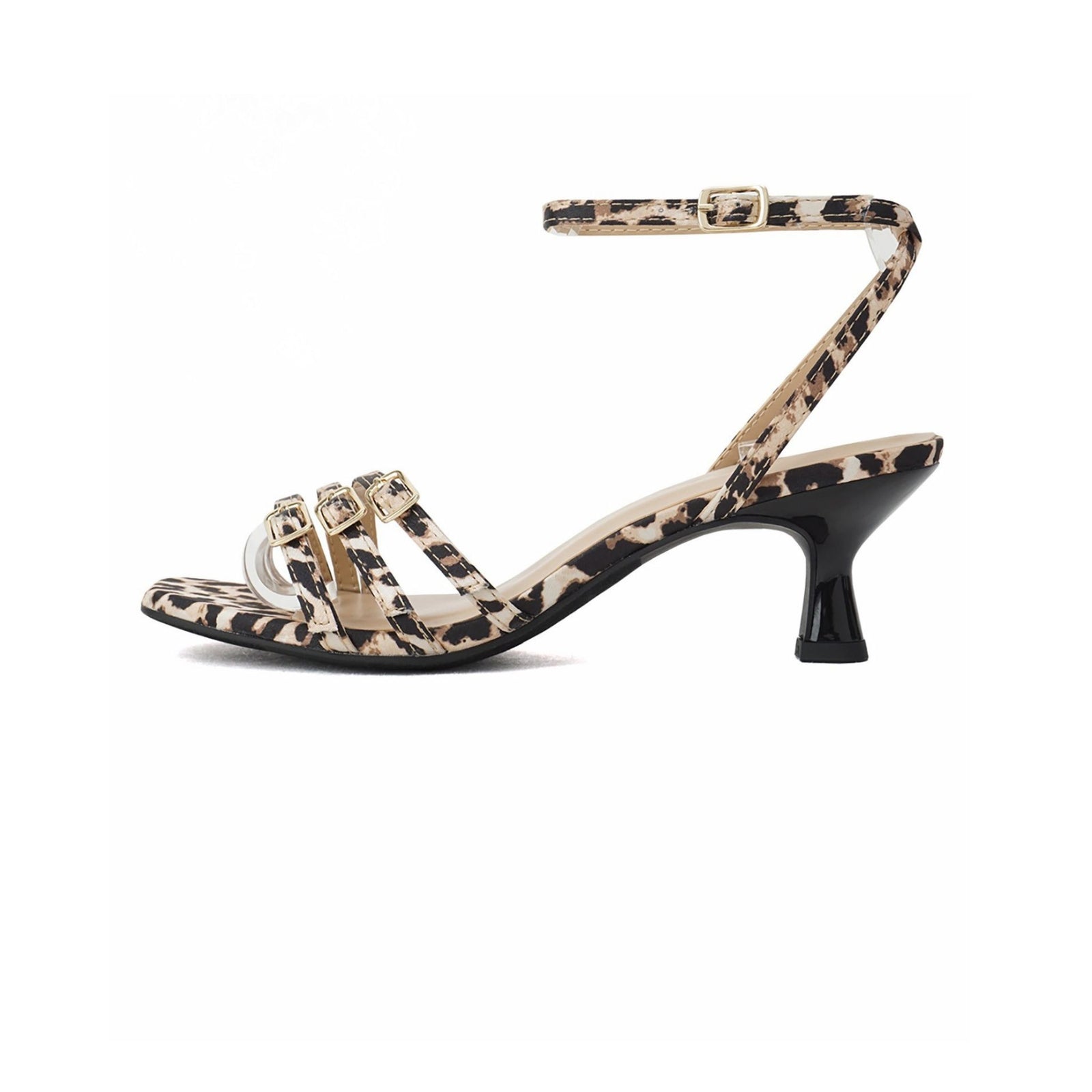 An ankle strap kitten heel sandal with a leopard print design on the straps and a textured rubber sole.